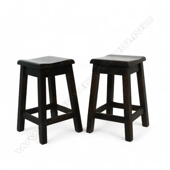 A pair of New Zealand c.1930s stained rimu stools,